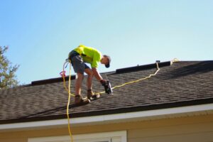 A Local Roofer Working On A Roof.