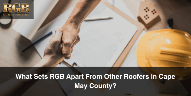 Two hand shaking over a roofing contract, portraying that among roofers in Cape May County, RGB seals deals again and again.