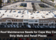 A strip mall with flat roof maintenance needs that property managers need to know about.